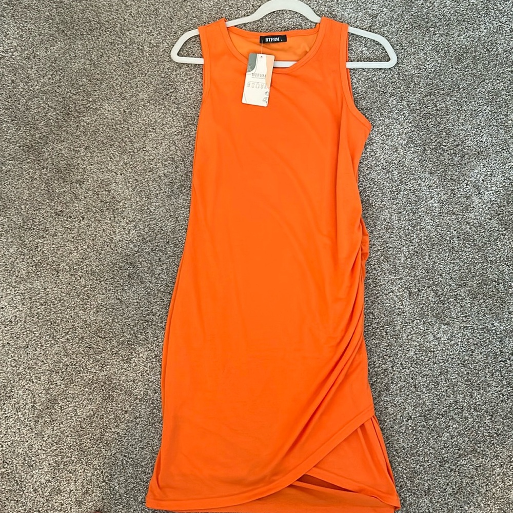 Fun bright orange dress.